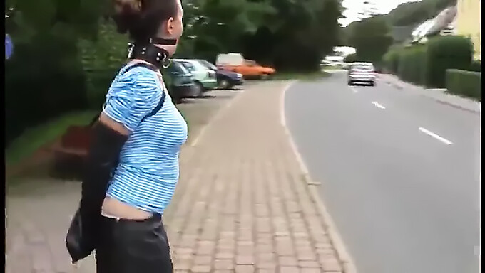 Ballgagged Millie Fenton In Public With Armbinder